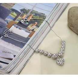 Um Im In- Und Ausland Ein Hohes Ansehen Zu Genießen Weibliches Hohles Fußkettchen Aus Platiniertem Titan