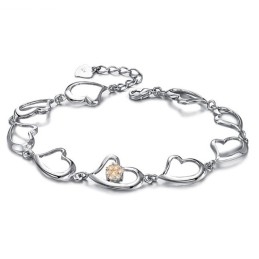 Weltweit Bekanntes Platiniertes Titanarmband Für Damen Mit Strass